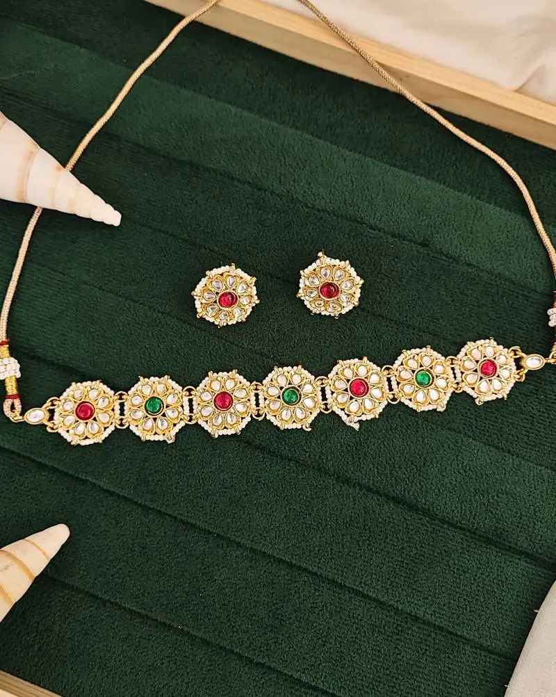 Antique gold plated choker necklace set with red green kundan stones, floral design, jewelry for all special occasions