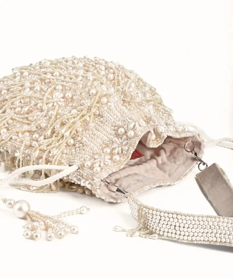 Nayera ivory suede pearl potli