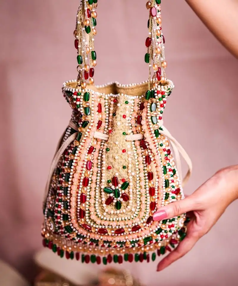 Aiza multi-coloured suede embellished potli