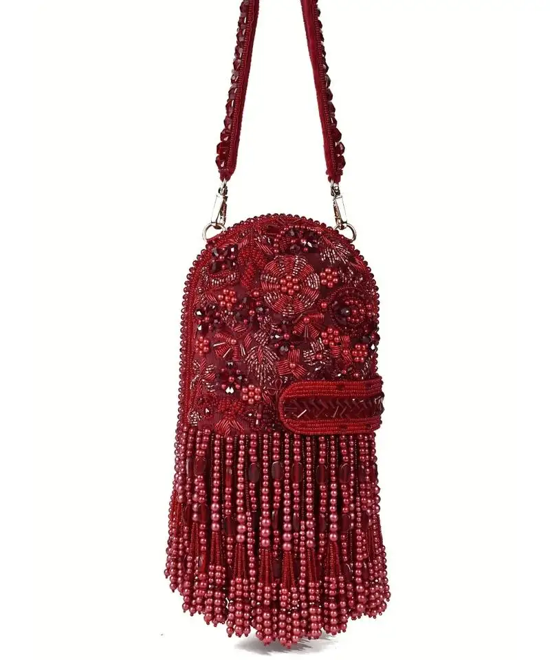 Azmat maroon suede embellished capsule bag