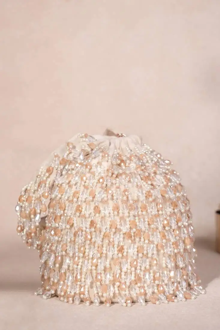 Kelly ivory pastel suede embellished bucket bag