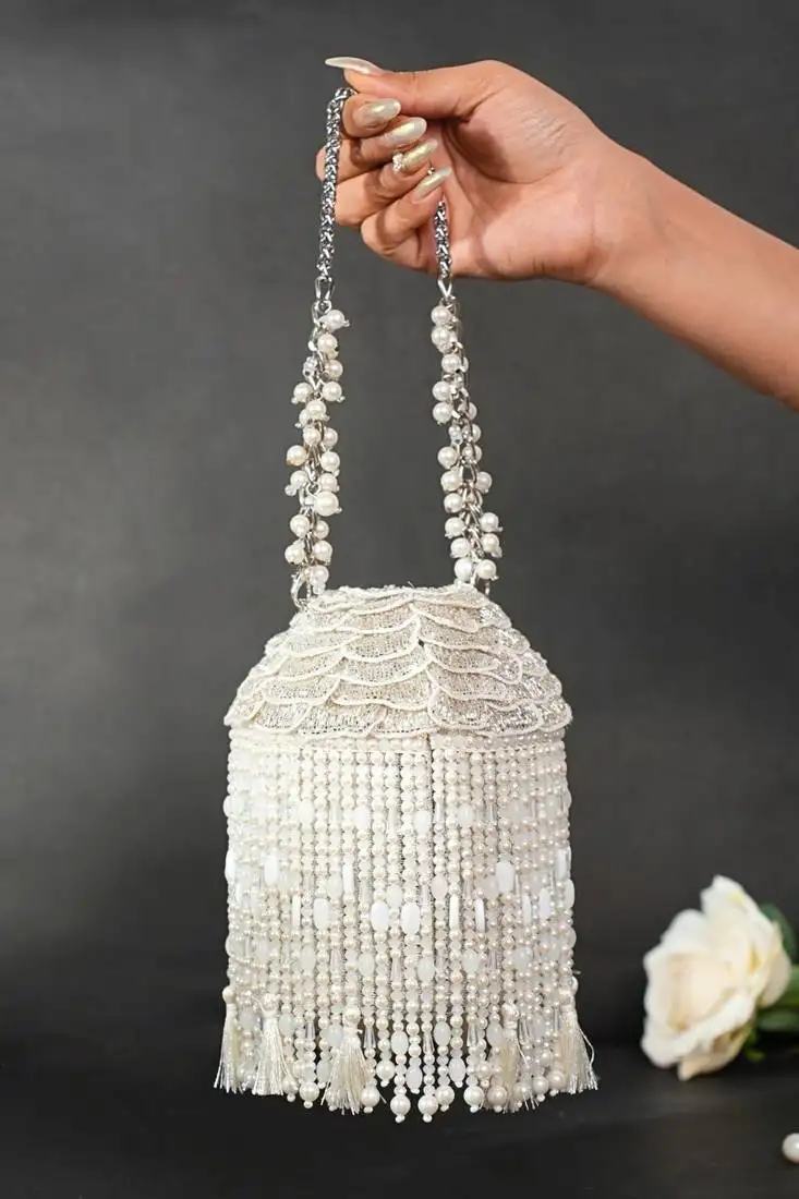 Nova silver suede embellished bucket bag