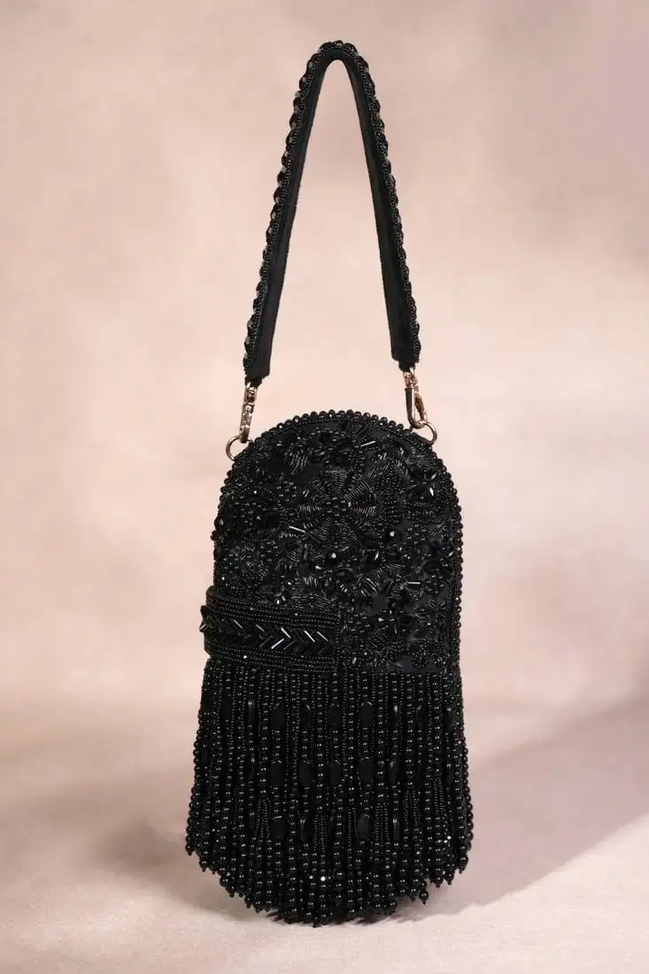Azmat black suede embellished capsule bag