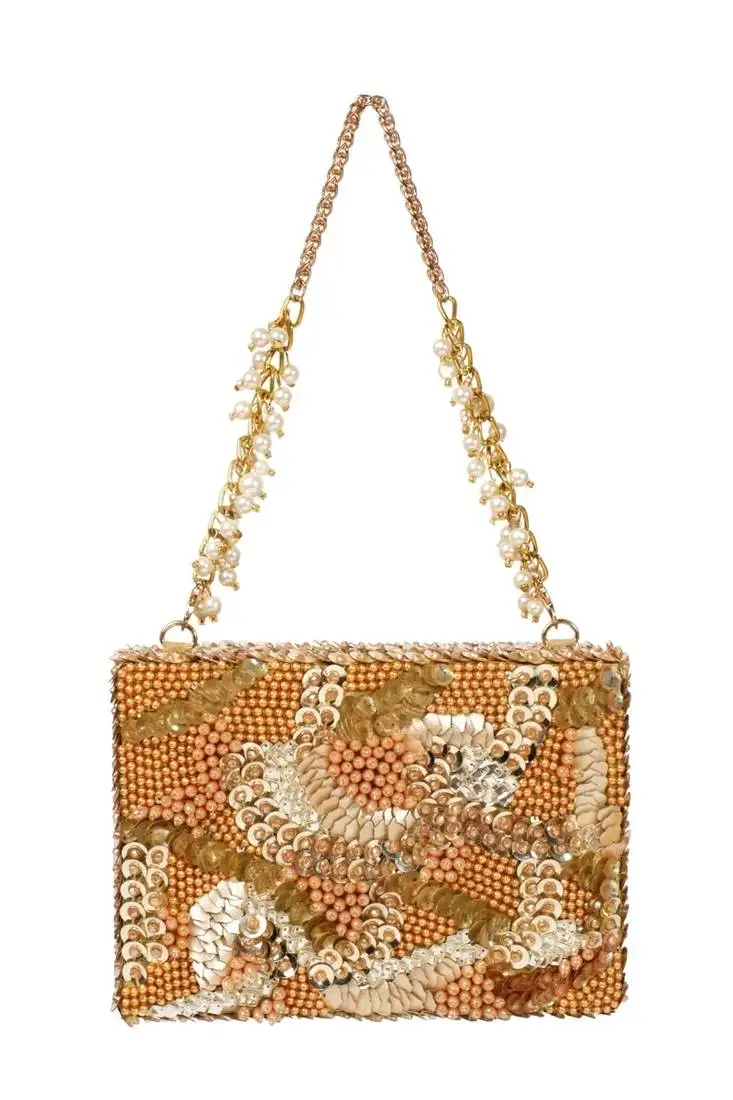 Amna gold suede embellished clutch