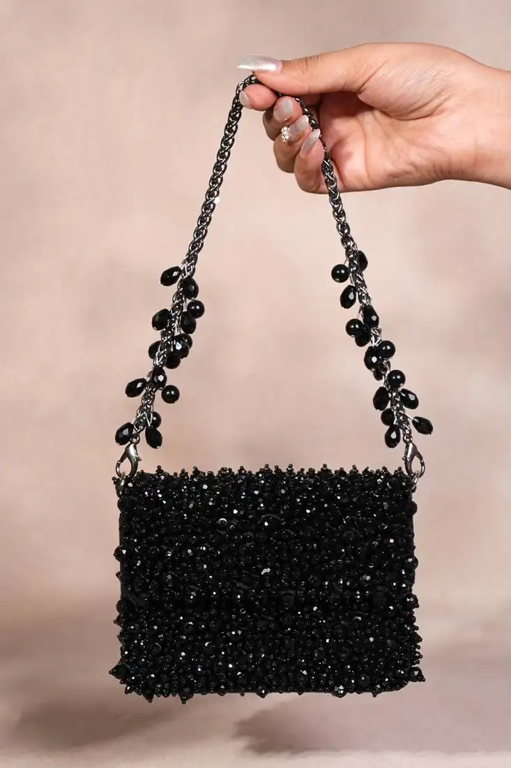 Kiyara black suede crystal embellished mini bag