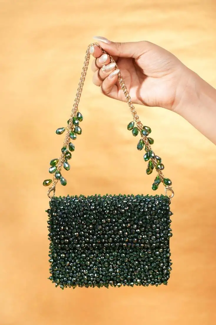 Kiyara green suede crystal embellished mini bag