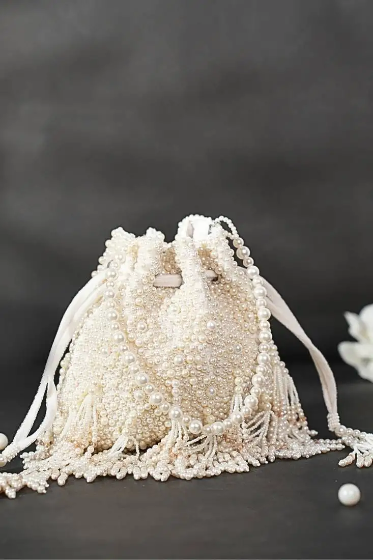 Emma ivory suede pearl embellished potli