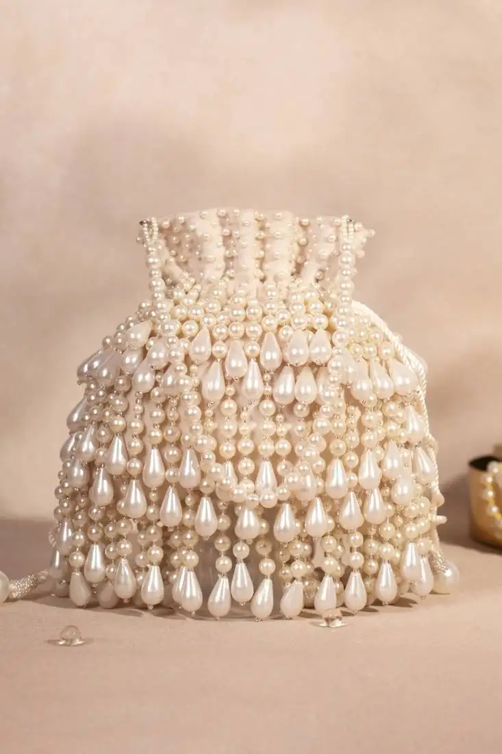 Zarah ivory pearl suede embellished potli