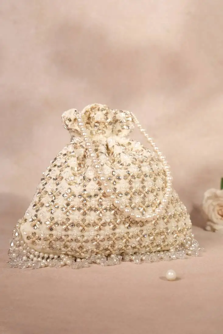 Aafreen ivory suede kundan embellished potli