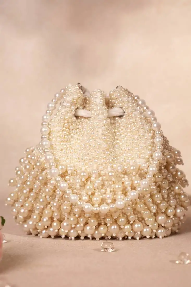Zeba ivory suede pearl embellished potli