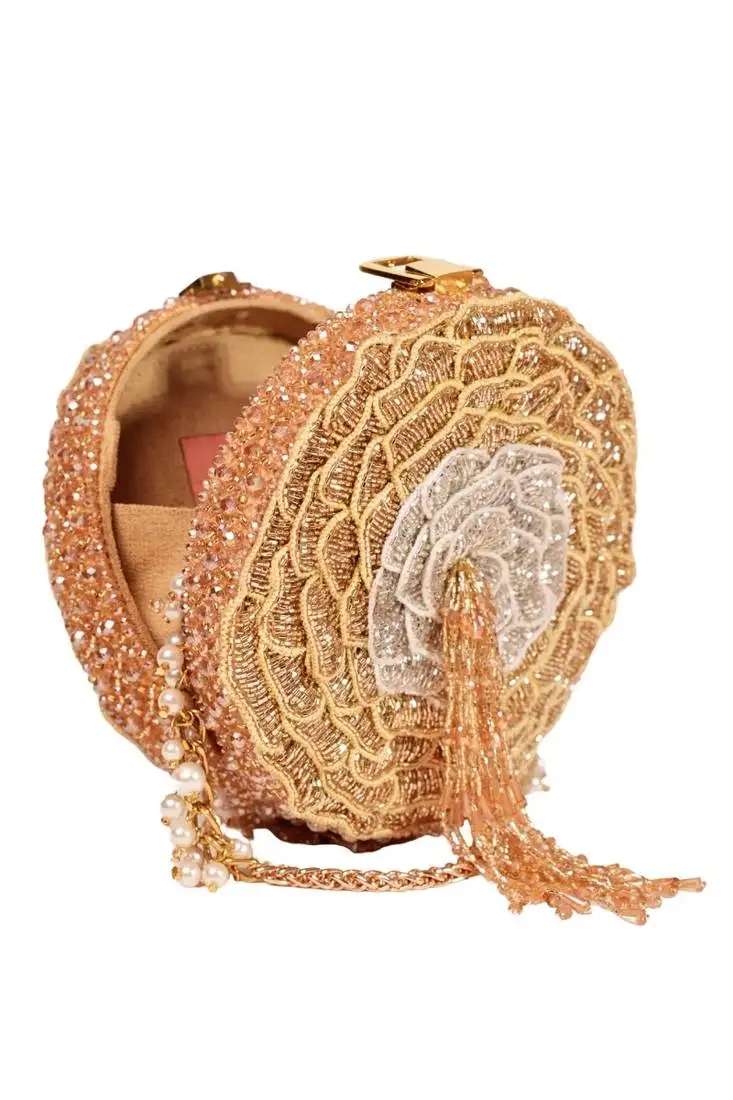 Amna gold suede embellished round bag