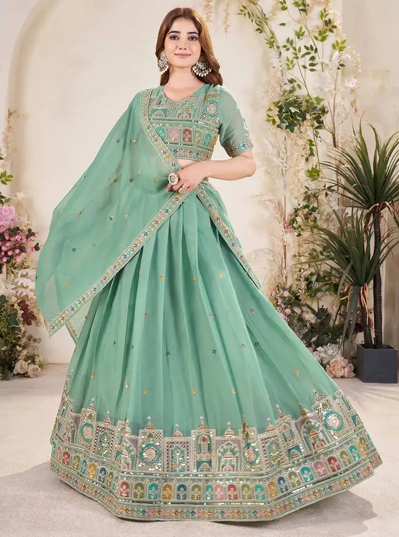 Pista green sequins embroidered georgette lehenga dress