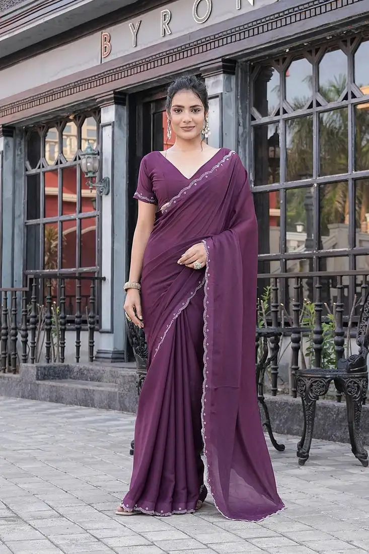 Silk blend wine solid embellished stone work sarees