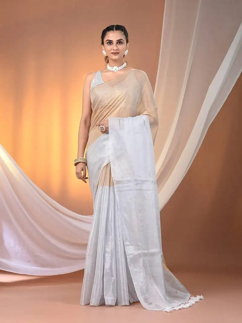 Golden and white tissue soft saree with pompom