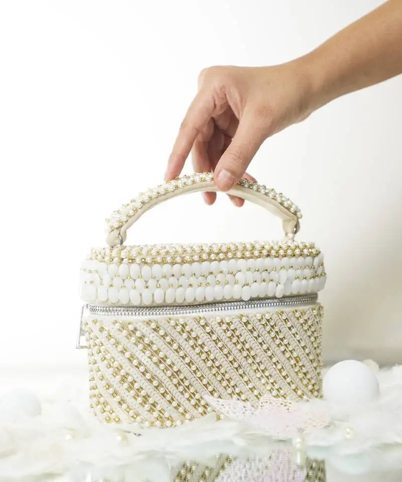 Beige sequenced suede base cube bag