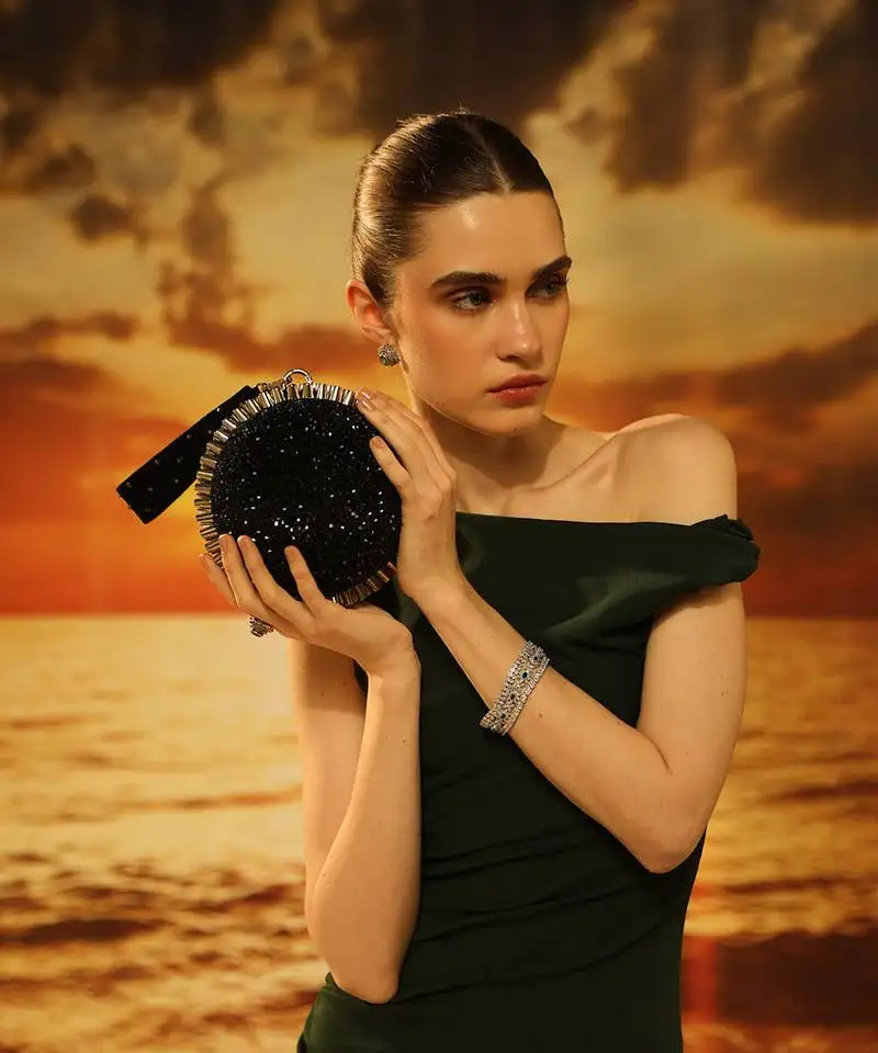 Black semi suede crystal embellished hand bag