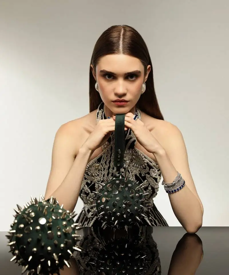 Green hand bag with semi suede velvet base