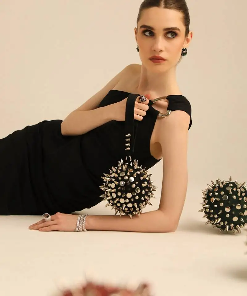 Black hand bag with semi suede velvet base