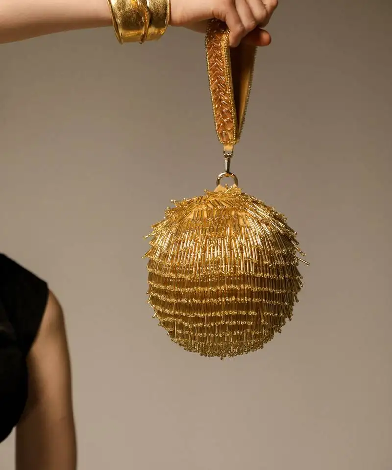 Gold handcrafted semi suede handbag