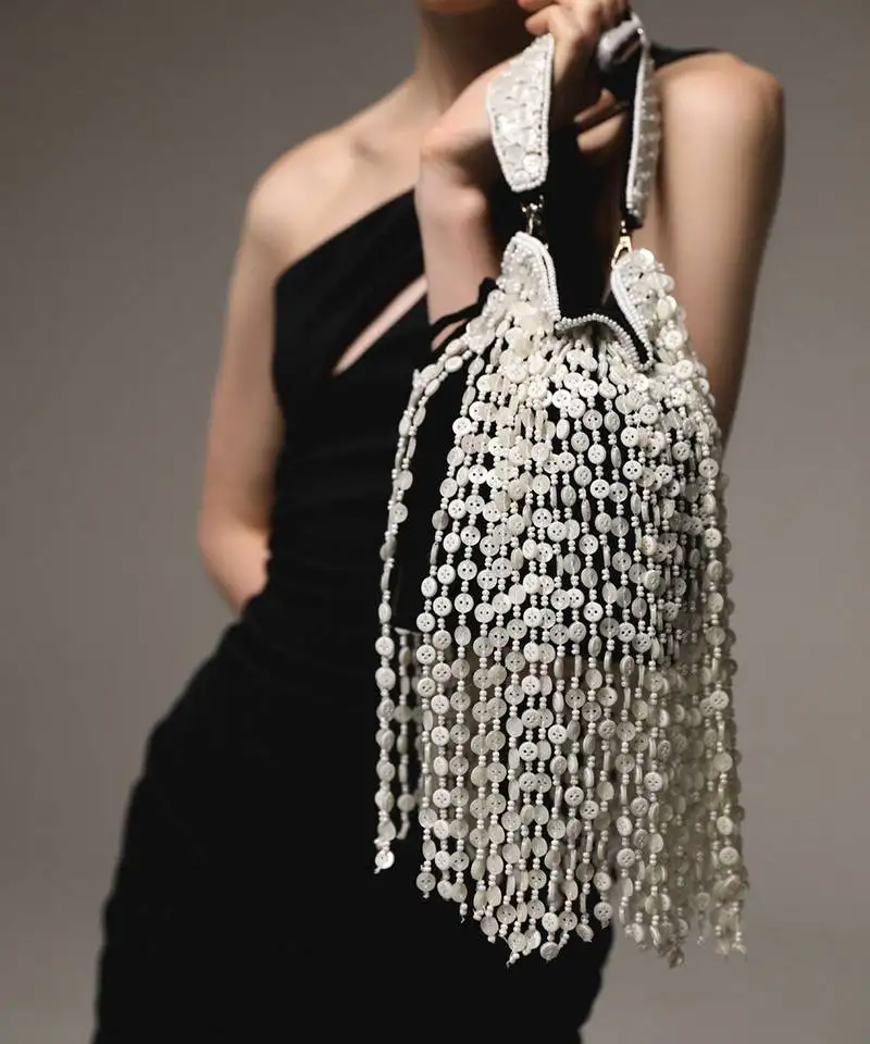 Black semi suede handbag with button latkan detailing