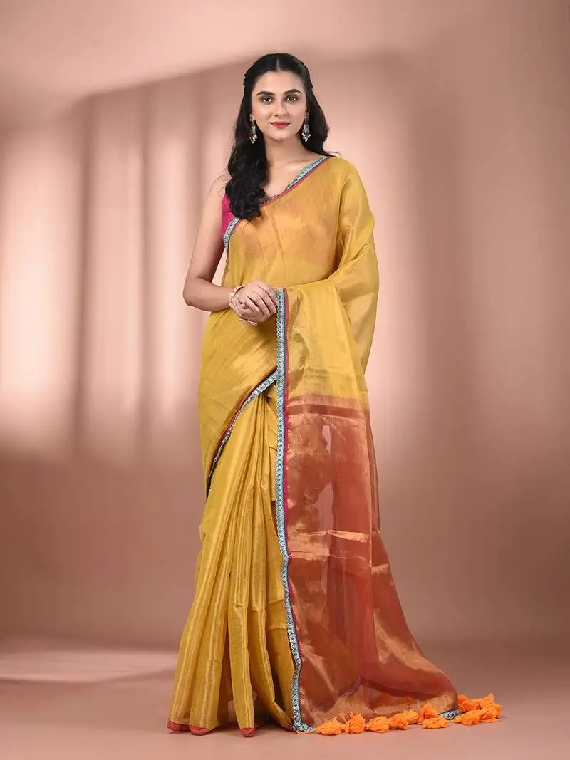 Yellow shimmer tissue saree with gota patti borders