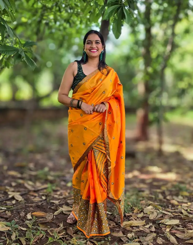 Yellow mekhela chador saree with unstitched blouse piece