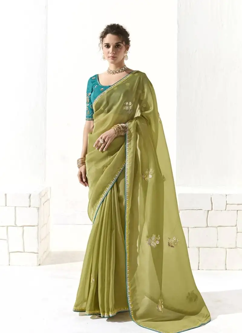 Light olive glass tissue saree with sequin zari weaving blouse