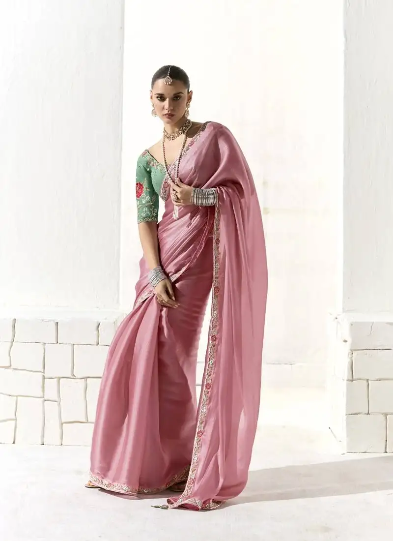 Baby pink glass tissue saree with sequin zari weaving blouse