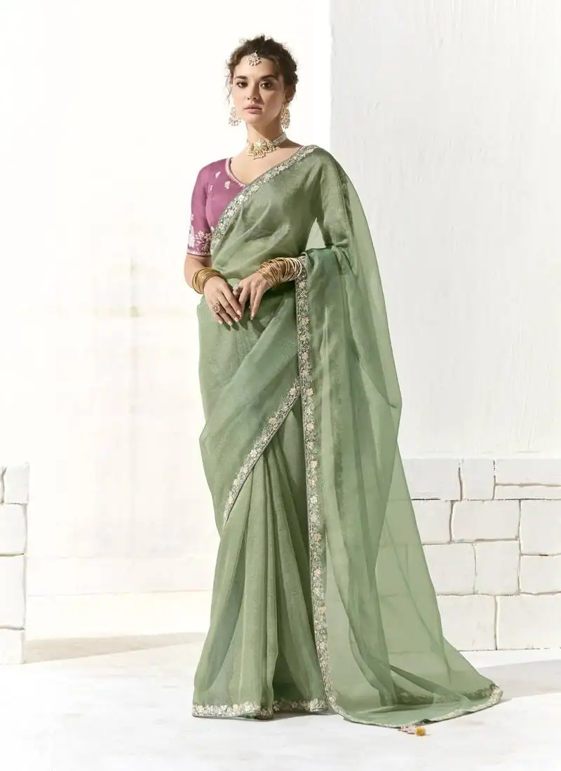 Pista glass tissue saree with sequin zari weaving blouse