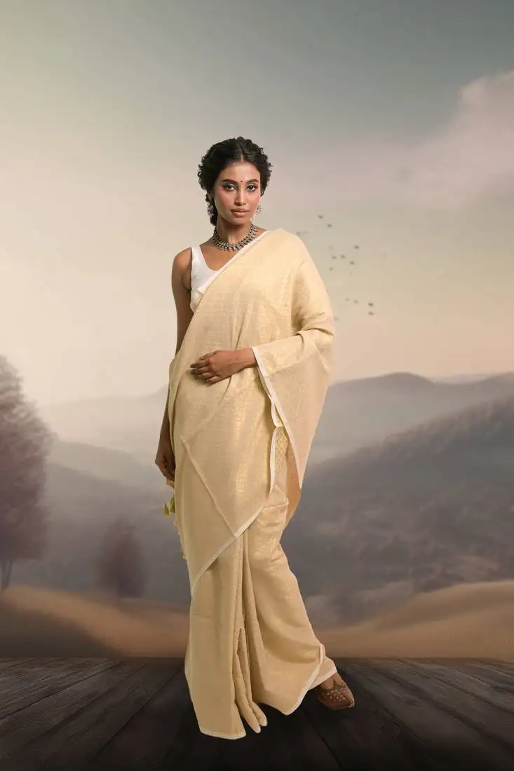 Ivory handloom cotton brocade saree with tassels