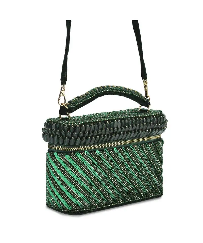 Green suede bag adorned with bead work