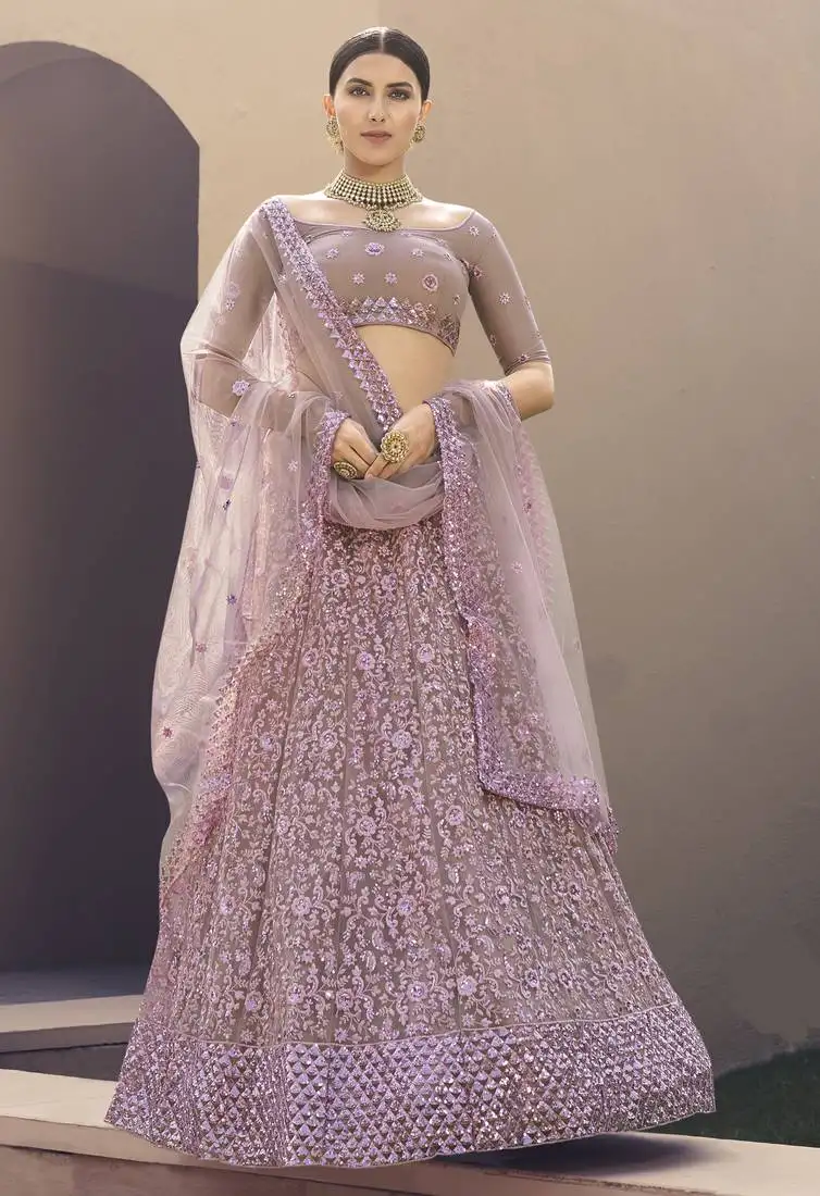 Ravishing mauve purple thread and sequins embroidered net fabric indian designer wedding lehenga choli dress