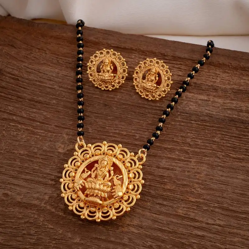 Black beads mangalsutra with laxmi pendant and earrings set one gram gold