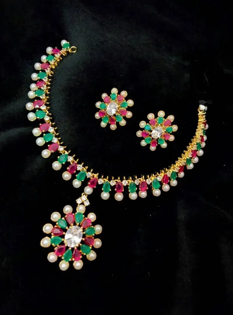 Georgeous gold plated ruby, kempu and pearl necklace set