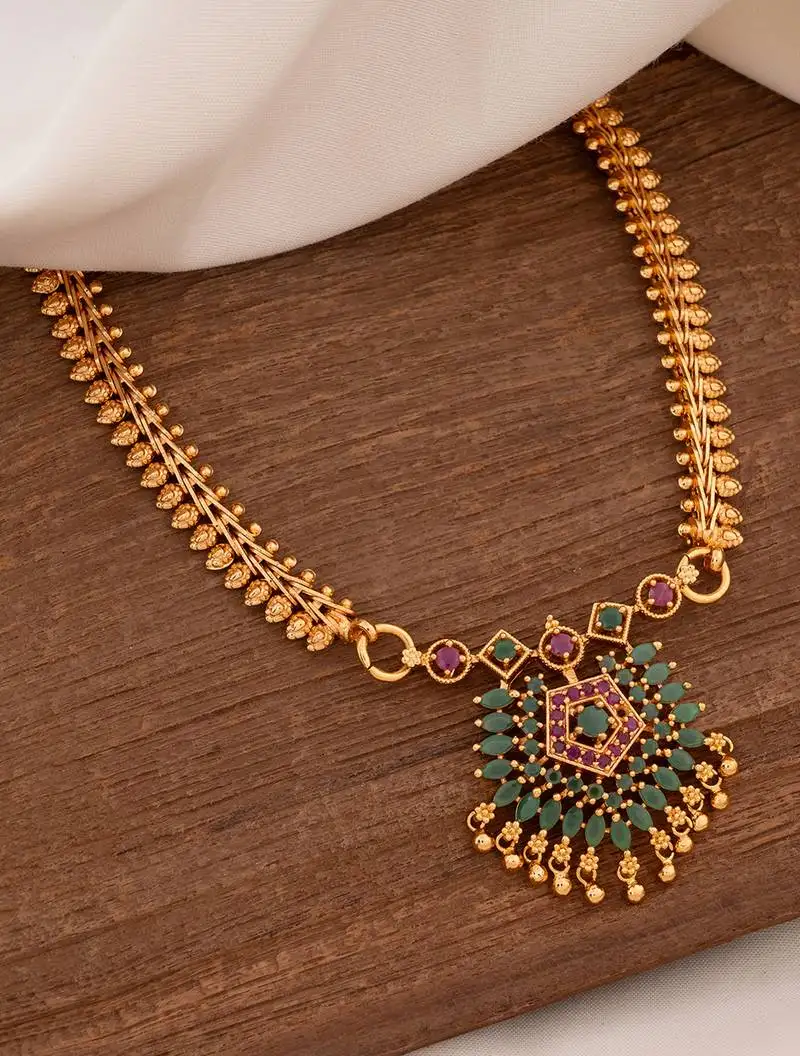 Golden leaf design necklace with pendant