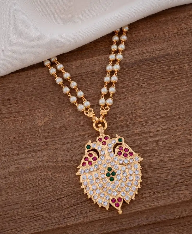 Off white pearl long with grandaberunda pendant one gram gold