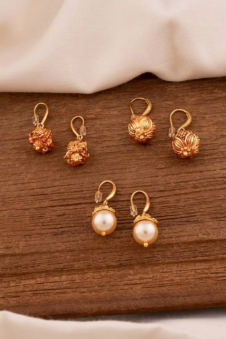 Three pairs of ethnic earrings one gram gold