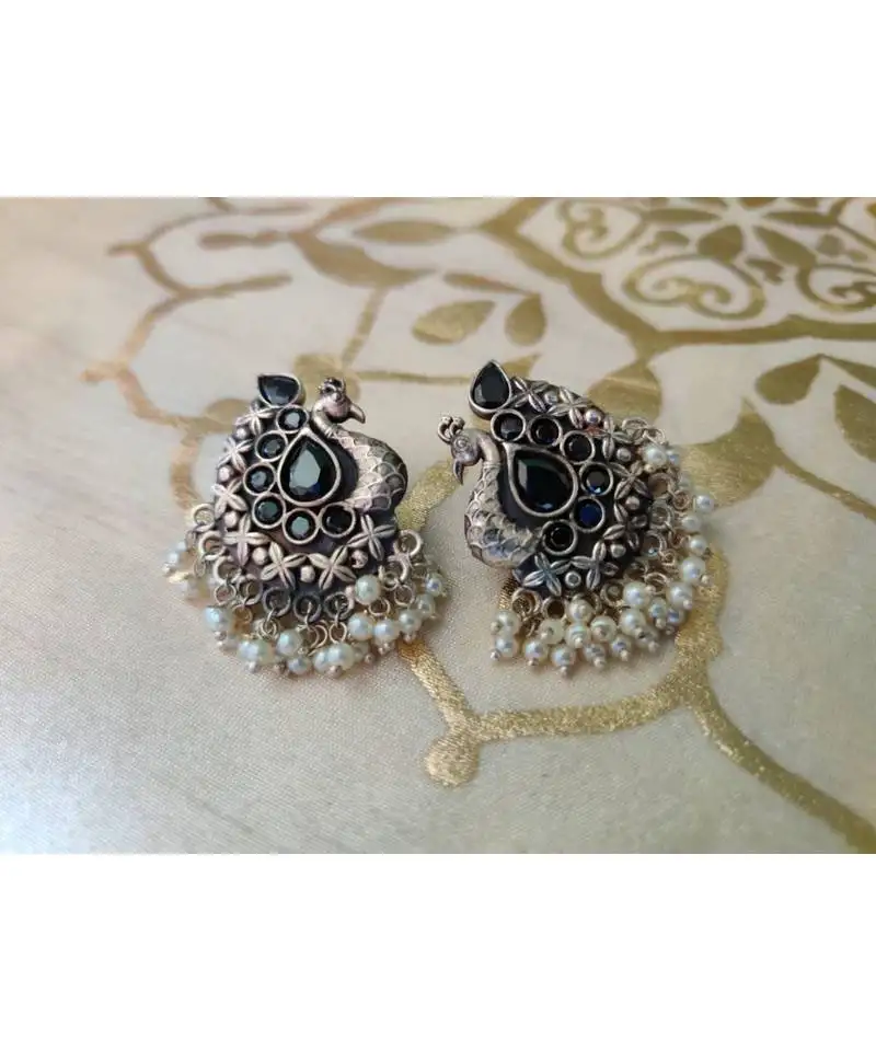 Black stone peacock pearl studs