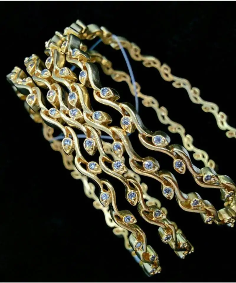 Georgeous high gold plated bangle with american diamond stones