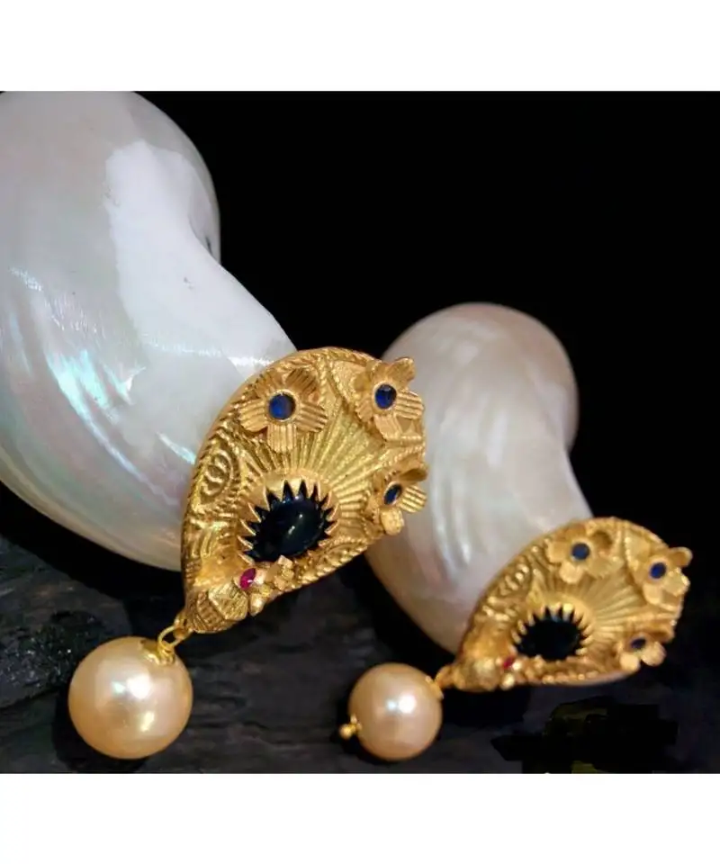 Beautiful gold plated peacock black colour studs