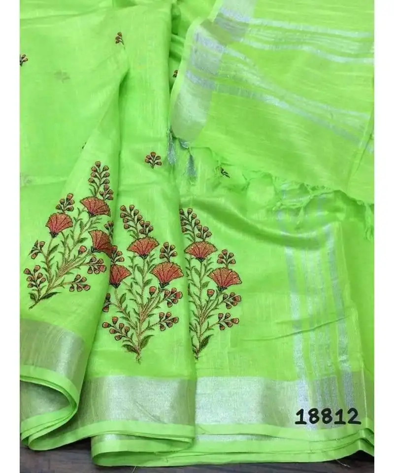 LightGreen handcrafted linen saree with embroidery work on the saree