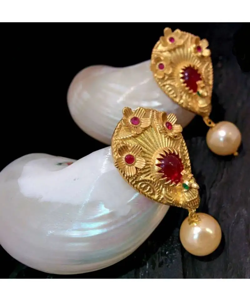 Beautiful gold plated peacock ruby studs