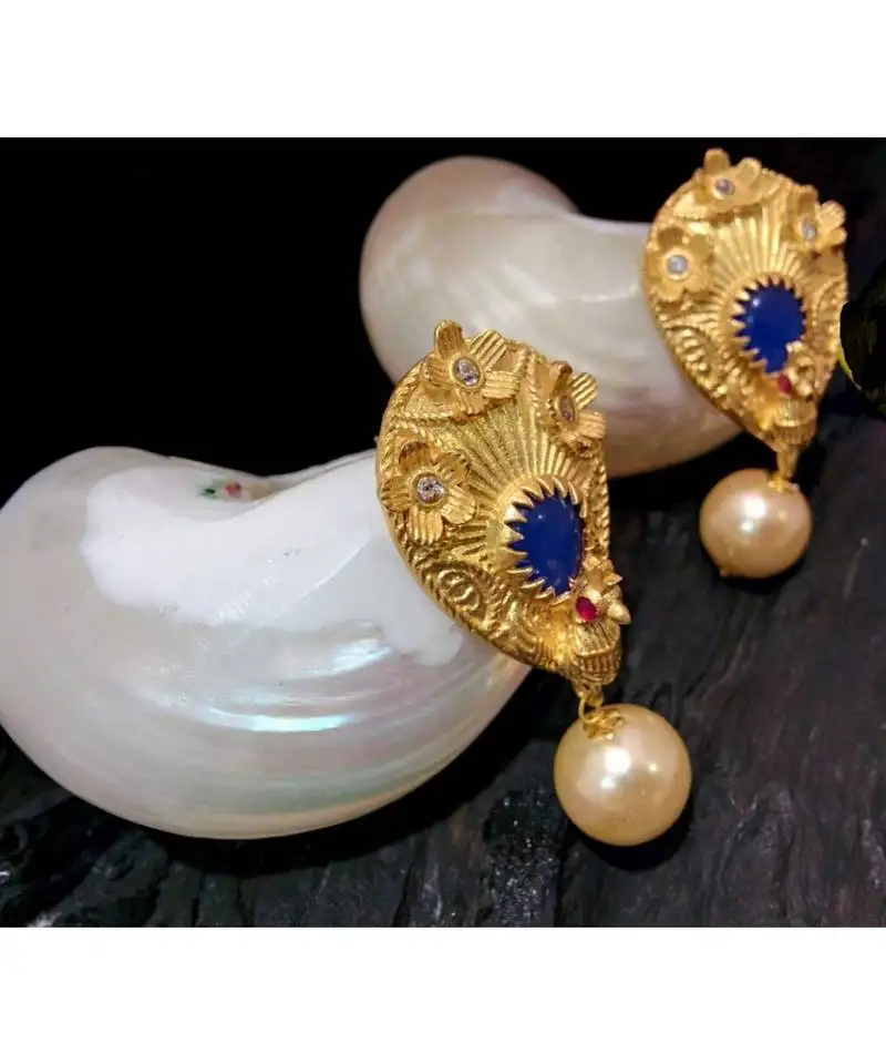 Beautiful gold plated peacock blue colour studs