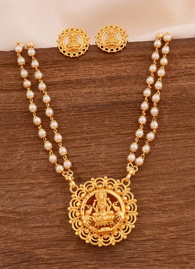 Off-white pearl necklace with laxmi pendant and earrings set medium length