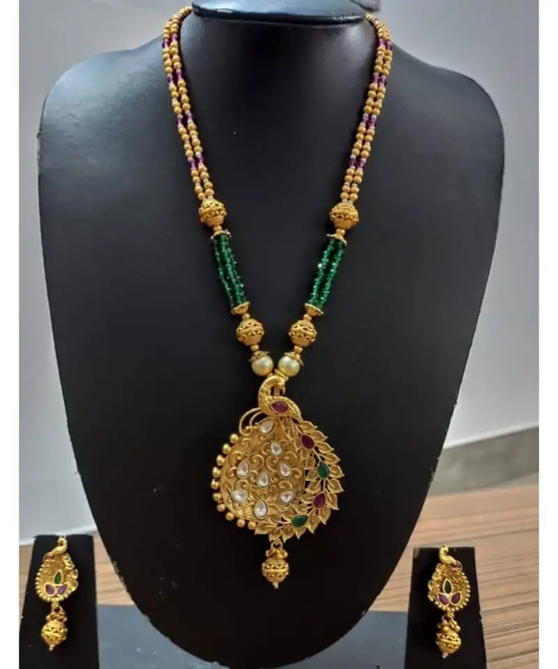 Ruby and embroled, kundans gold plated necklace set