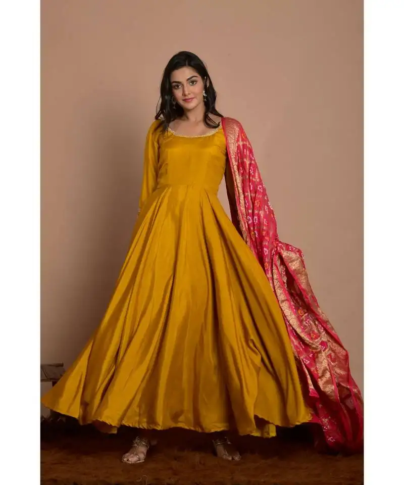 Tangerine yellow anarkali with peach gharchola dupatta