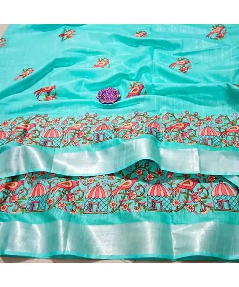 Blue handcrafted linen saree with embroidery work on the saree