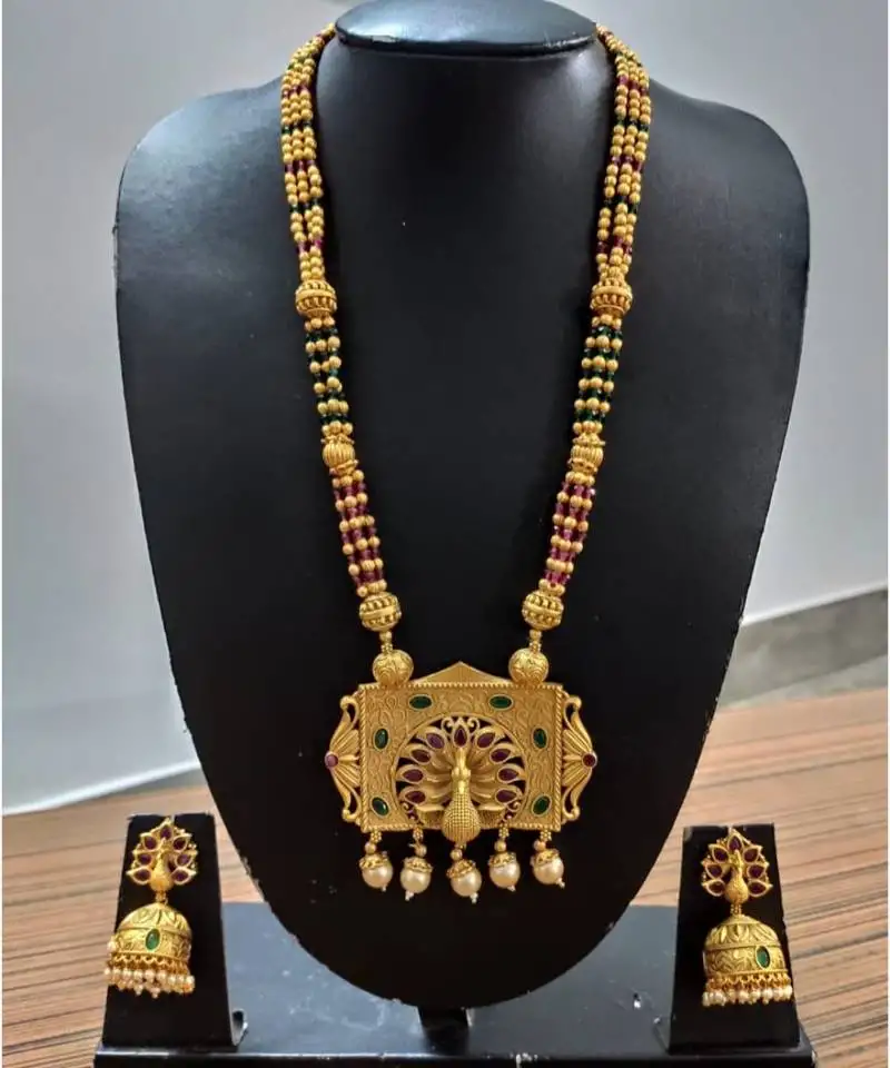 Ruby and embroled, peacock gold plated necklace set