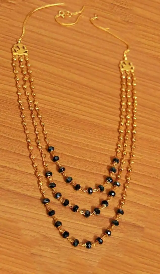 Black crystal & gold bead necklace