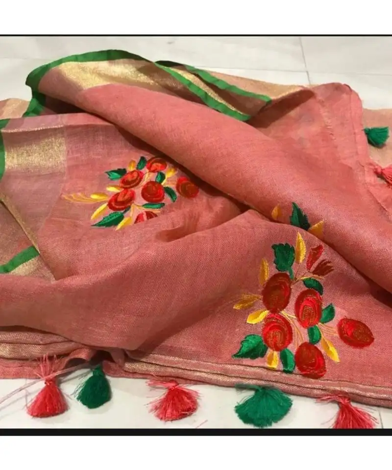 Brown handcrafted linen saree with embroidery work on the saree